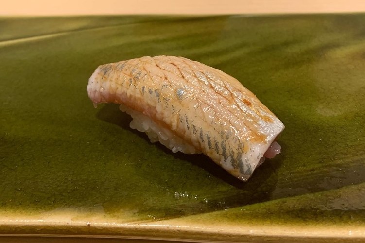 Iwashi sardine nigiri showing silver skin