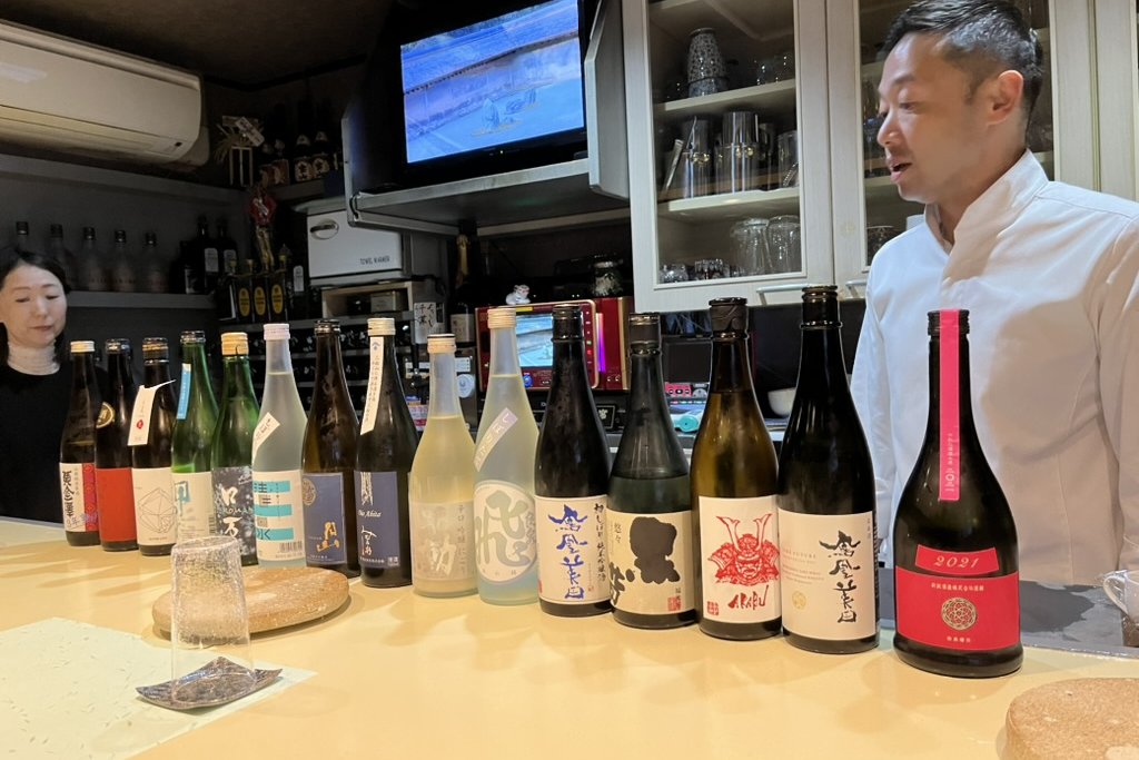 Sake pairing at the counter: drinking with the meal, not against it